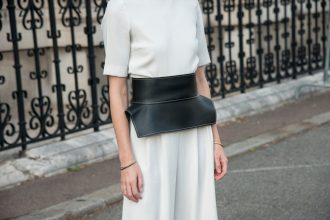 The allure of women's wide black belts: a fashion phenomenon